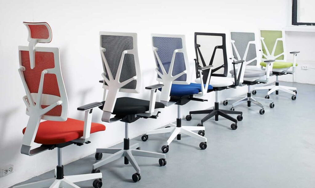 Row of 4Me office chairs featuring different coloured mesh back rest fabrics and seat upholstery