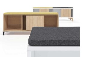 Low level office storage with cushioned tops that provide seating with storage beneath