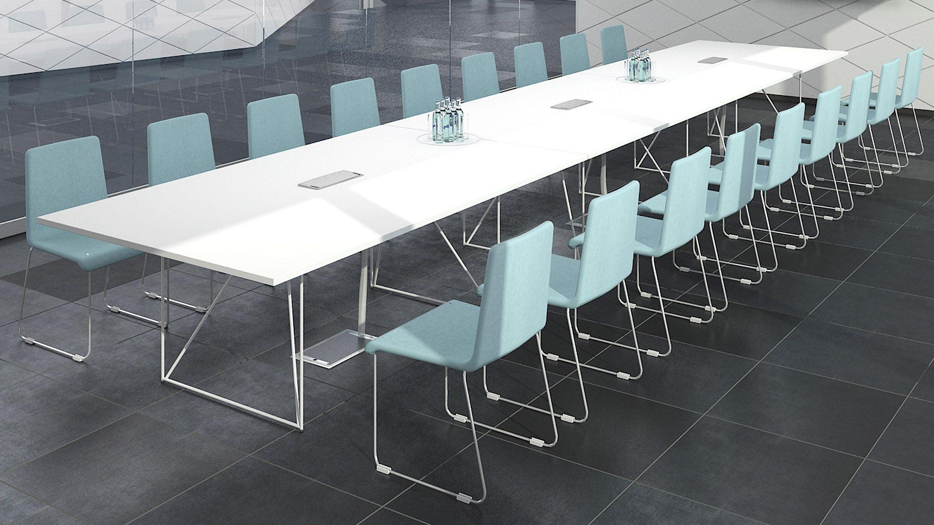 Air tables placed together to create one very long meeting table