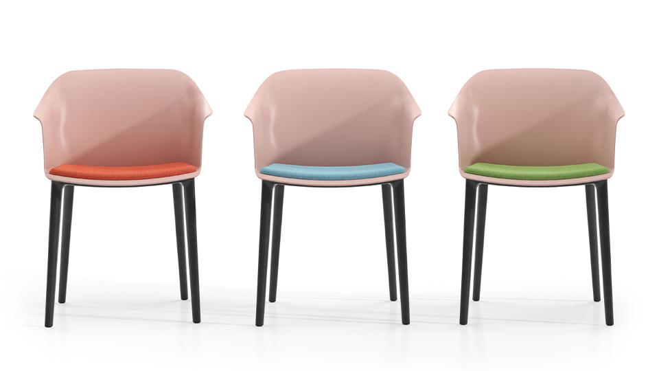 Comfort Tones chairs shown with different coloured upholsted seat pads